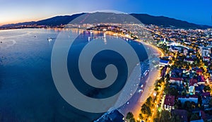 Evening panorama of the seaside resort of Gelendzhik. the sun went down, dark blue sky and sea.