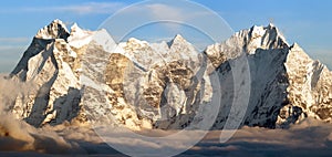 Evening panoramic view of mounts Kangtega and Thamserku