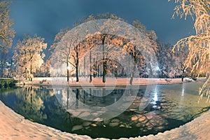 Evening park after snowfall