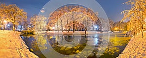 Evening park after snowfall