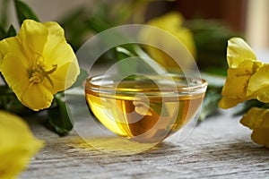Evening primrose oil in a glass bowl on a table