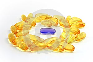 Evening Primrose Oil pills with a blue pill in the middle