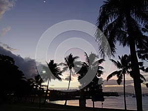 Evening scene of tropical beach in moonlight at a lagoon