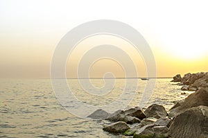 Evening seascape with a yacht