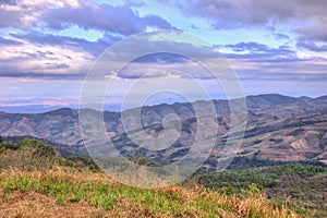 Evening sky and panoramic views from mountaintop of Phu Lom Lo, Phu Hin Rong Kla National Park, Kok Sathon, Dan Sai District, Loei