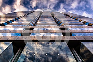 Evening sky reflecting in modern glass architecture at 250 West