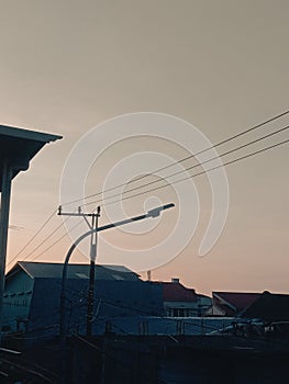 Evening sky view with lights and cables
