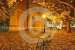 Evening still life with bench in front of The New Evangelical Church in Kezmarok town