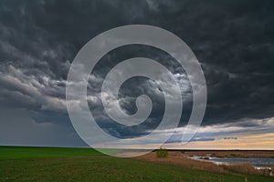 Evening storm over lake in remote wild area