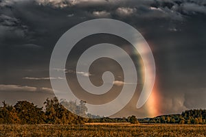 Evening Stormy Cloudy Blue Gray Sky. Use it As a Background. Rainbow in Background.