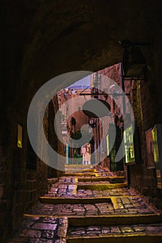 Evening street of old Jaffa city after rain in Tel-Aviv, Israel