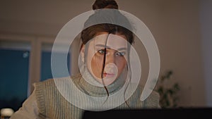 Evening student working laptop sitting house closeup. Woman studying remotely