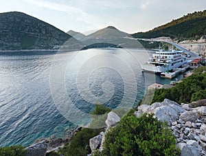 Evening summer coastline with cargo ship (Ston, Croatia)