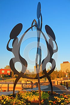 Yellowknife, Northwest Territories, Canada - Evening Sun Shining on the Statue of Dancers at Sombe K`e Park and Civic Plaza