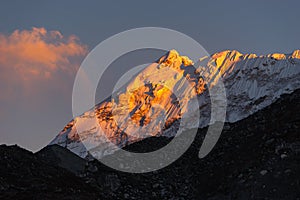 Evening sunset light over snow Himalaya mountain view from Chukung village, Everest base camp trekking route, Nepal