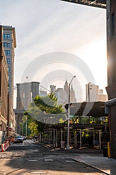 Evening sunset view of the Brooklyn bridge from under the Manhattan brdige