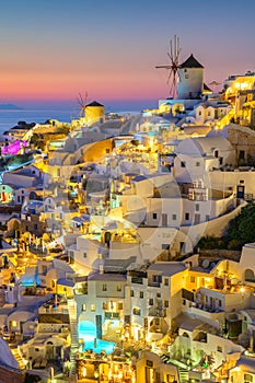 Evening sunset view of traditional Greek village Oia on Santorini island in Greece