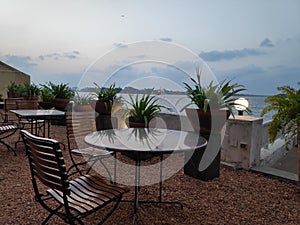 Evening terrace by the sea - dinner table