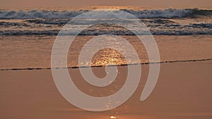 Evening tide waves on arambol beach. Goa India.