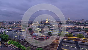 Evening top view of three railway stations day to night timelapse at the Komsomolskaya square in Moscow, Russia