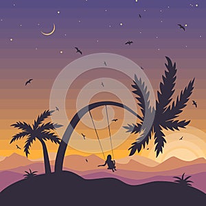 Evening on tropical island. Girl meets sunset, riding on swing under  palm tree