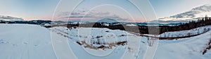 Evening twilight winter mountain ridge panorama