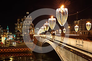 Evening view of Big Moskvoretsky bridge with Christmas illumination, Moscow, Russia