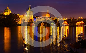 Evening view of Charles Bridge with illumination. Prague.