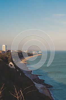 Evening view of the Eastbourne city from  Seven Sisters, Clifftop Paths Nature Reserve and the Chalk Cliffs with the English