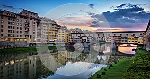 Evening view of the famous bridge Ponte Vecchio on the river Arno in Florence, Italy.