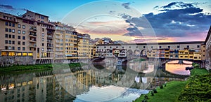 Evening view of the famous bridge Ponte Vecchio on the river Arno in Florence, Italy