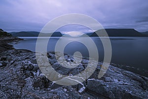 Evening view of the fjords and mountains around SolavÃ¥gen in Norway. photo