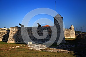 Evening view of the Fortress of San Salvador de La Punta. Malecon, Old Havana. Cuba