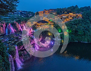 Evening view of Furong Zhen town and waterfall, Hunan province, Chi