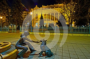 Evening view of the Girl with her dog sculpture, Vigado Square, Budapest, Hungary