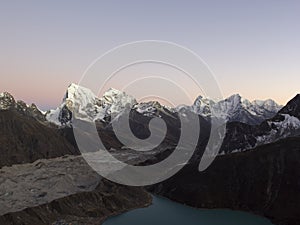 Evening view from Gokio Ri on Gokyo lake, Gokyo village, Ngozumba glacier and mountains. Hiking in Nepal Himalayas