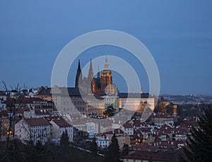 Evening view of illuminated St. Vitus Cathedral gothic churche and Prague Castle panorama, hradcany and Mala Strana