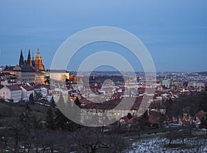 Evening view of illuminated St. Vitus Cathedral gothic churche and Prague Castle panorama, hradcany and Mala Strana