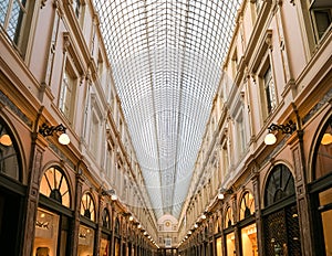 Evening view inside Saint Hubert Gallery building in Brussels Belgium