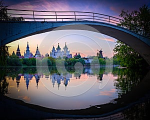 Evening view on Izmailovsky Kremlin with reflections in lake