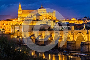 Evening view of the Mosque-Cathedral and Roman Bridge in Cordoba, Spa