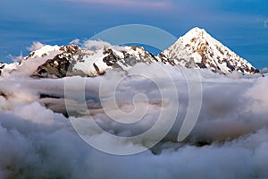 Evening view of Mount Salkantay in the middle of clouds