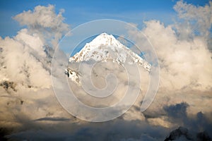 Evening view of Mount Salkantay in the middle of clouds