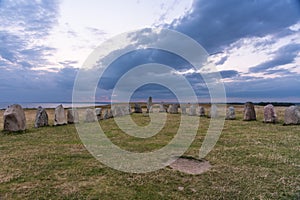 Evening view of the mysterious Ales stones on the south east coast of Sweden photo