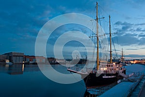 Evening view of the Neva river on a background of yachts