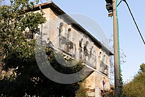 Evening  view of the quiet, green Hovevei Tsiyon Street in the old Jerusalem district Talbia - Komiyum in Jerusalem, Israel