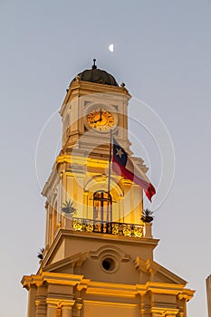 Evening view of Royal Court Palace now Chilean National History Museum tower with a moon, Santiago, Chi