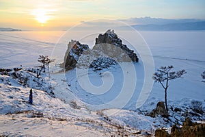 Evening view of Shaman rock one of sacred place in frozen lake Baikal in winter season of Siberia, Russia.