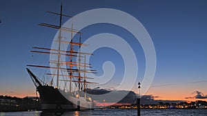 Evening view of ship Passat in the Old Town pier of Travemunde, Germany