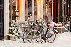 Evening view of snow covered historic houses in the Dutch city center of Doesburg, The Netherlands